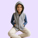 Sense-ational You QuietSense Sound Reducing Sensory Youth Vest modeled on a white background