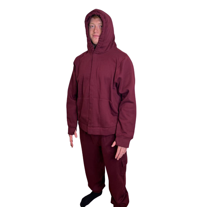 Person wearing a Sense-ational You QuietSense Sound Reducing Sensory Maroon Hoodie on a white background