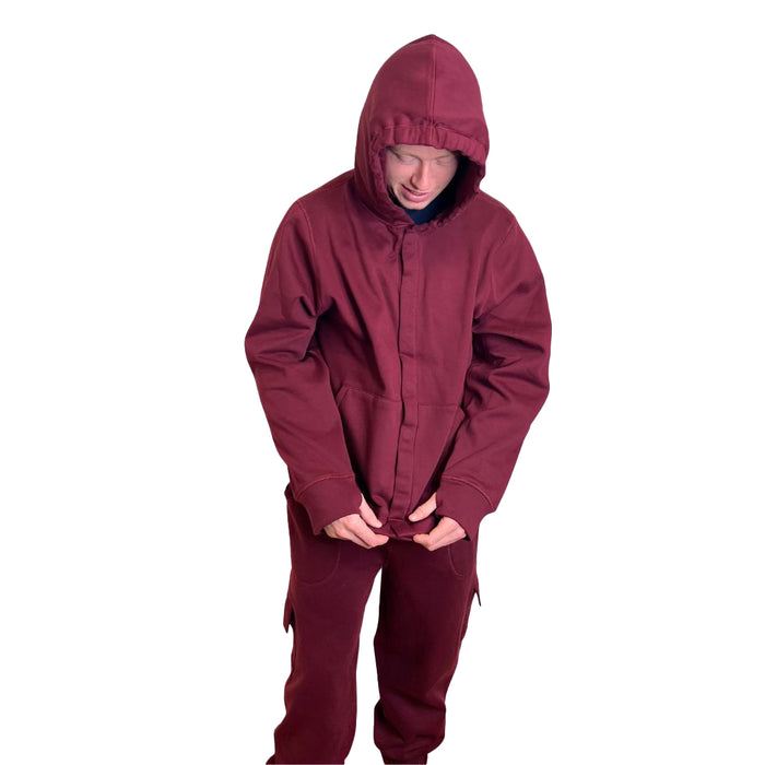 Person closing up a Sense-ational You QuietSense Sound Reducing Sensory Maroon Hoodie on a white background