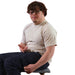 Person wearing a Sense-ational You Sensory Friendly Fidget Constellation Joggers sitting on a stool against a white background