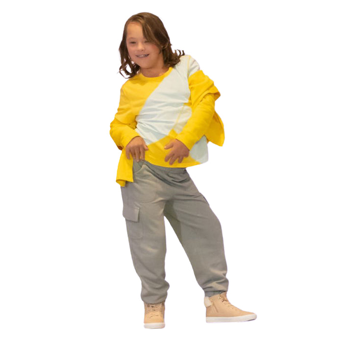 Child wearing a Sense-ational You Sensory Friendly Fidget Youth Grey Joggers on a white background