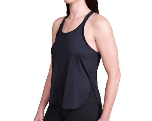 Side front angle of model wearing Slick Chicks Adaptive Athletic Tank Top against a plain white background