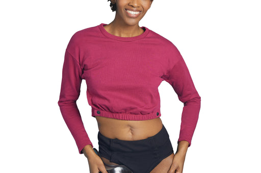Front angle of model wearing Slick Chicks Adaptive Long Sleeve Lounge Shirt in plum, against a solid white background