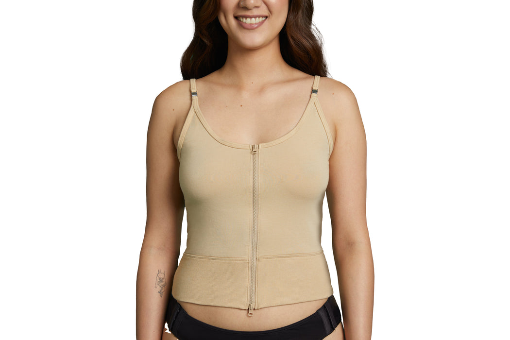 Front angle of a model wearing Slick Chicks Adaptive Two-Way Front Zip Cami in beige, against a plain white background