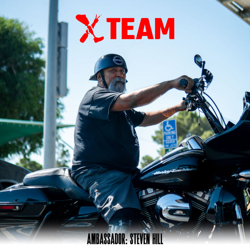 TEAM AMPLIFE AMBASSADOR STEVEN HILL ON HIS MOTORCYCLE