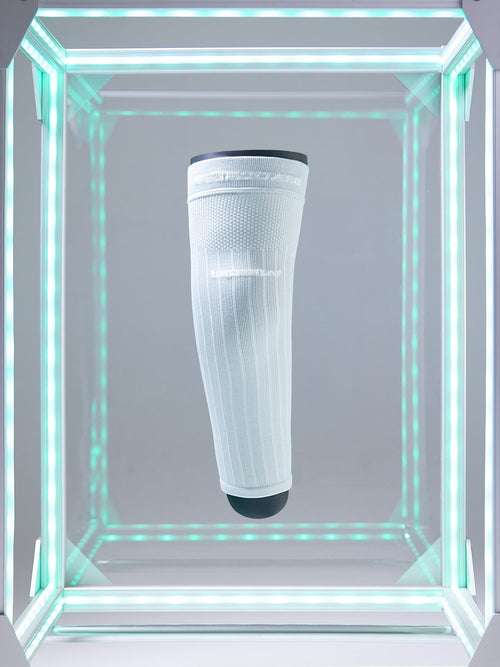 Ethnnocare Underlay floating inside of a box with teal lighting