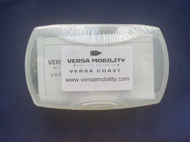 Versa Coast kit in a shrink-wrapped clear plastic storage case with a Versa Mobility label, on a dark blue background