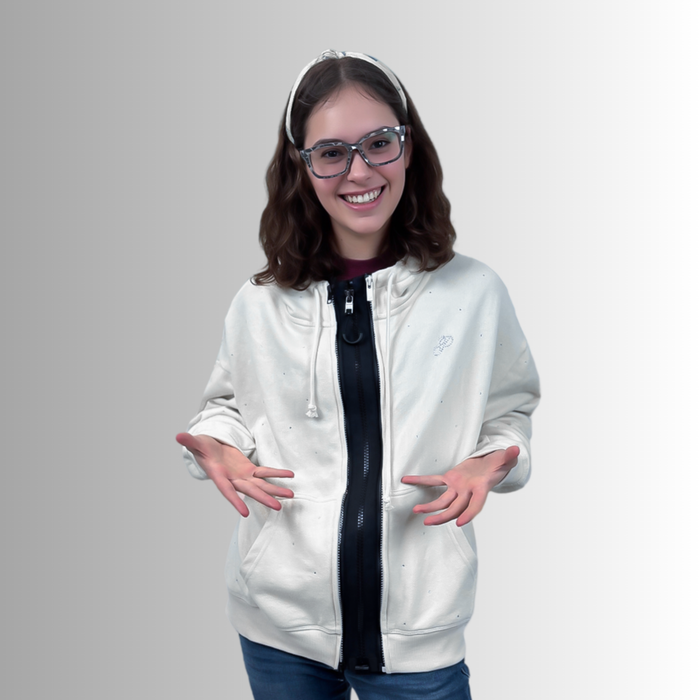 Person wearing a white zip up hoodie with ZipperBuddy MagZip Magnetic Zipper No-Sew Jacket Closure Attachment on a grey background