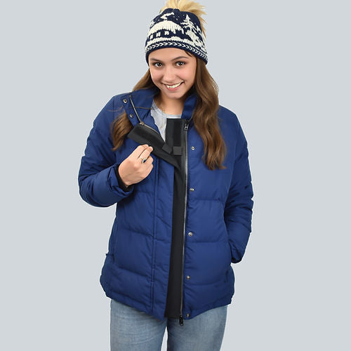 Person wearing a blue puffer jacket with the ZipperBuddy No-Sew Hook & Loop Jacket Closure Attachment on a white background