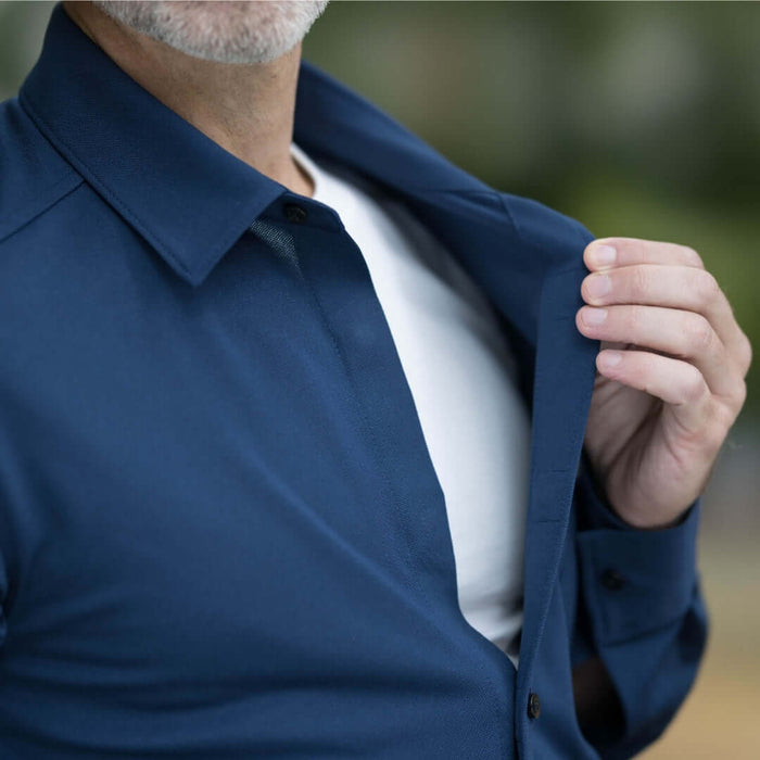 MagnaReady Adaptive True Navy Magnetic Front Long Sleeve Cooling Shirt with Pocket - worn by man with adaptive needs