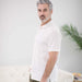 MagnaReady White Pique Knit Short Sleeve Polo with Magnetic Closures - front view