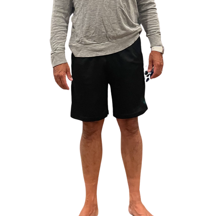 Person wearing the befree zipOns Adult Lightweight Adaptive Shorts on a white background