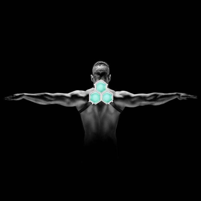 Cryo2O Pain Relief Cryotherapy Ice Pack System on model's upper back on a black background