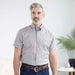 MagnaReady Dove Grey Short Sleeve Button Down Collar Shirt with Magnetic Closures - worn by man with adaptive needs