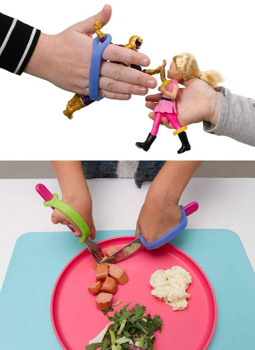 Children's toy utensils with dolls and a plate of food with an EaZyHold Grip Aid on a white background