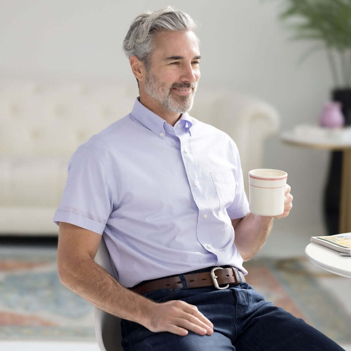 MagnaReady Lavender Short Sleeve Button Down Collar Shirt with Magnetic Closures - worn by man with adaptive needs