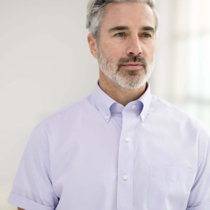 MagnaReady Lavender Short Sleeve Button Down Collar Shirt with Magnetic Closures - worn by man with adaptive needs