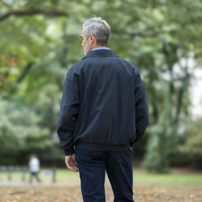 MagnaReady X Weatherproof Navy Golf Jacket with Magnetic Closures - lifestyle shot