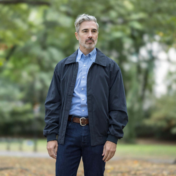 MagnaReady X Weatherproof Navy Golf Jacket with Magnetic Closures - lifestyle shot