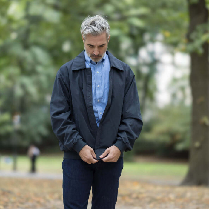 MagnaReady X Weatherproof Navy Golf Jacket with Magnetic Closures - lifestyle shot