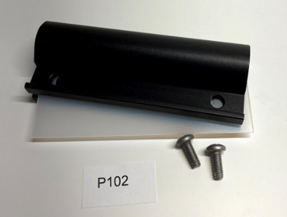 FreeWheel Wheelchair Attachment TiLite Clamp and Shim on a table with two screws and paper with P102 printed on it.