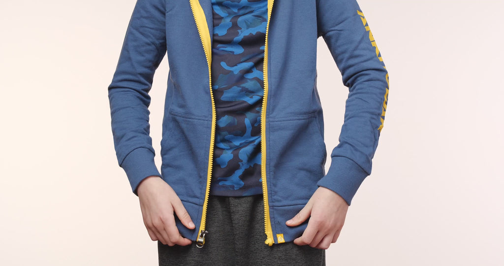 MagZip Kids Adaptive Hoodie with Magnetic Zipper with demonstration of the magnetic zipper being used on a white background.