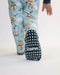 Detail of Rainn Bamboo Critter Hollow Zipp Jammies foot cover traction on a white background