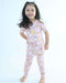Child standing while wearing a Rainn Bamboo Rainnbow Pull Up Romper on a white background