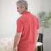 MagnaReady Red Heather Pique Knit Short Sleeve Polo with Magnetic Closures - lifestyle shot