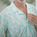 MagnaReady Untucked Short Sleeve Cooling Shirt with Magnetic Closures in Blue Leaf - front view