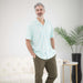 MagnaReady Untucked Short Sleeve Cooling Shirt with Magnetic Closures in Blue Leaf - worn view
