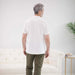 MagnaReady White Pique Knit Short Sleeve Polo with Magnetic Closures - lifestyle shot