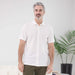MagnaReady White Pique Knit Short Sleeve Polo with Magnetic Closures - lifestyle shot